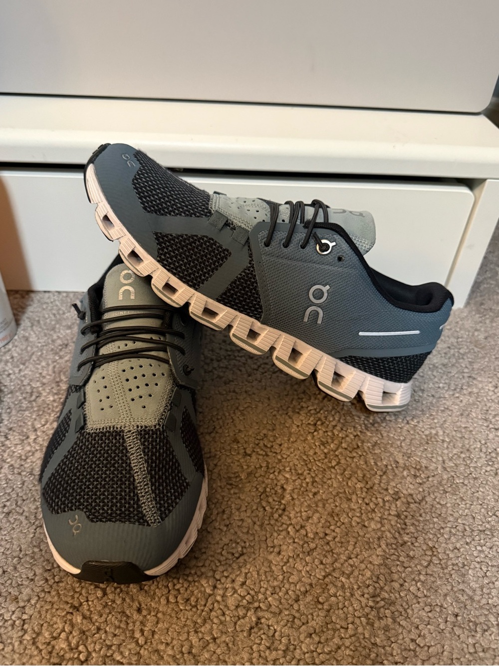On Running Woman’s Cloud-like Athletic Shoes in blue and grey